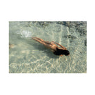 Photo Art Print of a naked Woman swimming in shallow water at a Bali beach at low tide